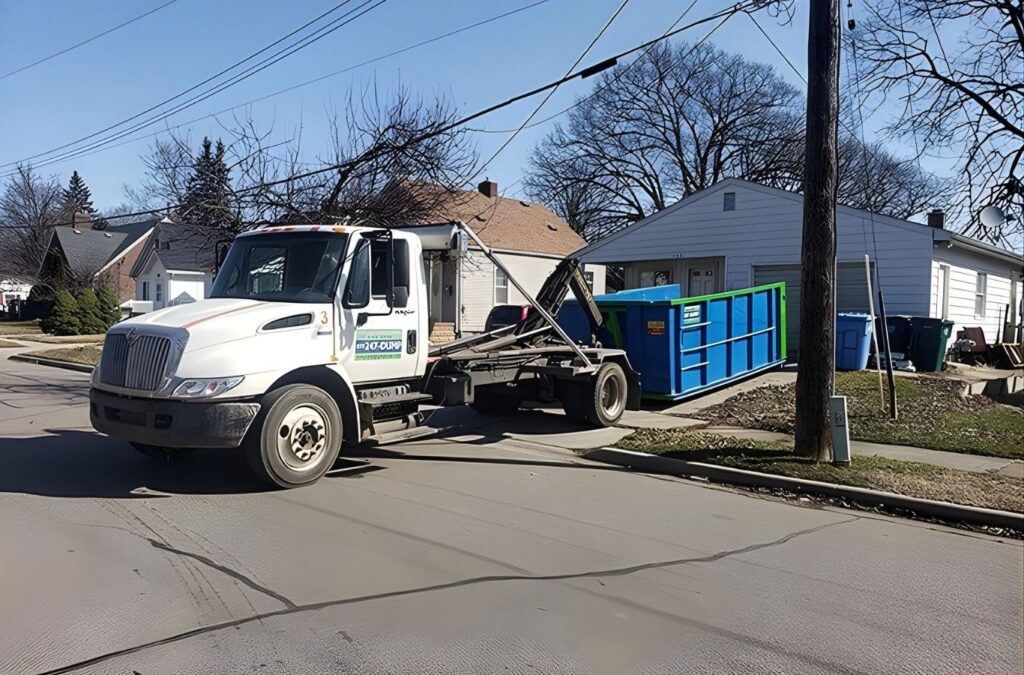 Simplified Dumpster team member performing dumpster rental in DeWitt, MI, showing benefits of hiring a local professional
